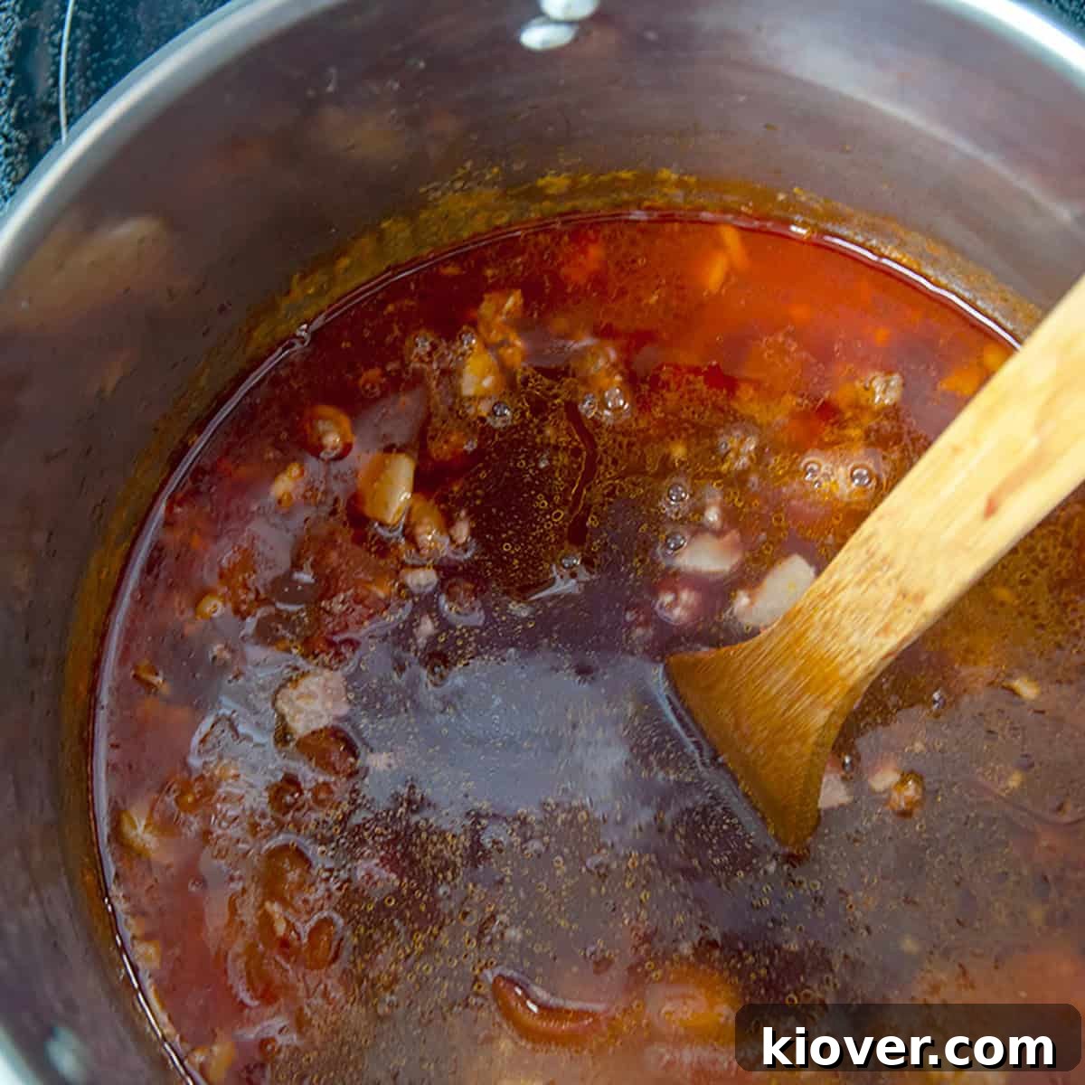 Sauce simmering in a pot.