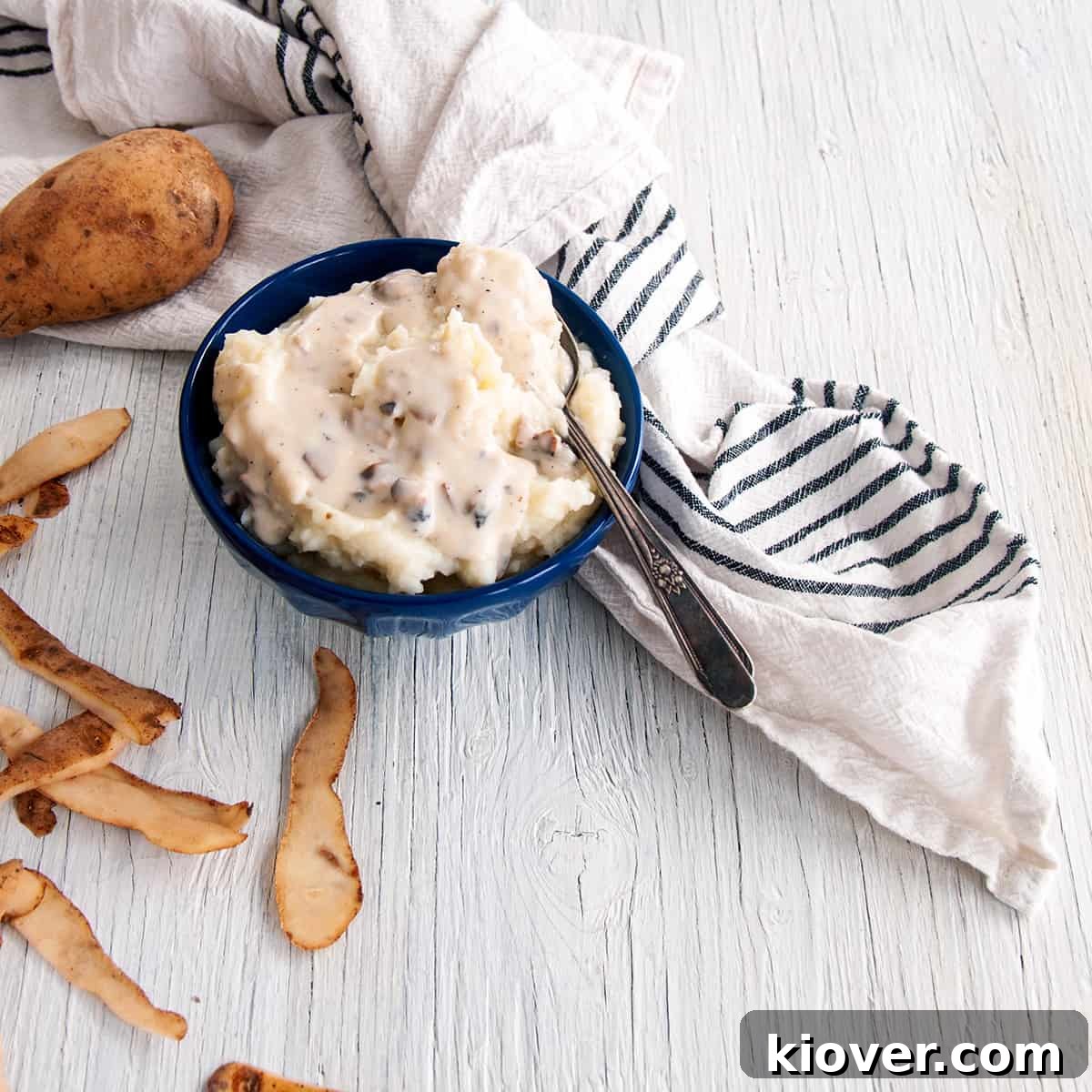 Mashed Potatoes Mashed Potatoes in a blue bowl.