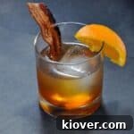 Bacon Bourbon Maple Old Fashioned cocktail, ready to be served