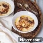 A bowl of creamy Rømmegrøt, garnished with cinnamon and melted butter, resting on a wicker platter beside a white linen cloth, evoking a sense of rustic elegance and comfort.
