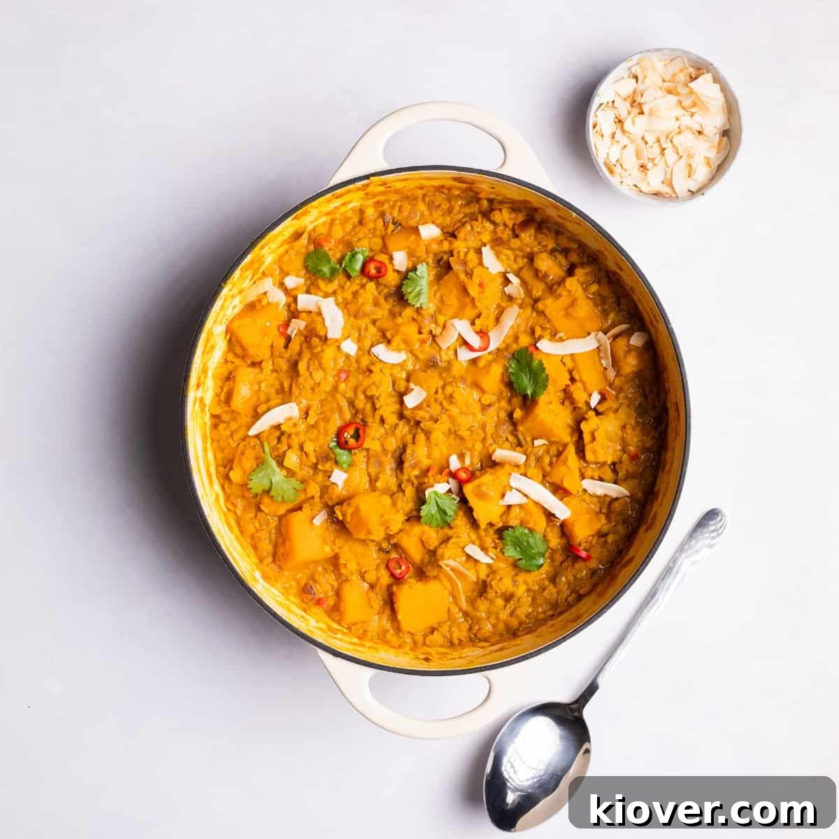 Coconut Dhal served with fresh coriander and coconut flakes.