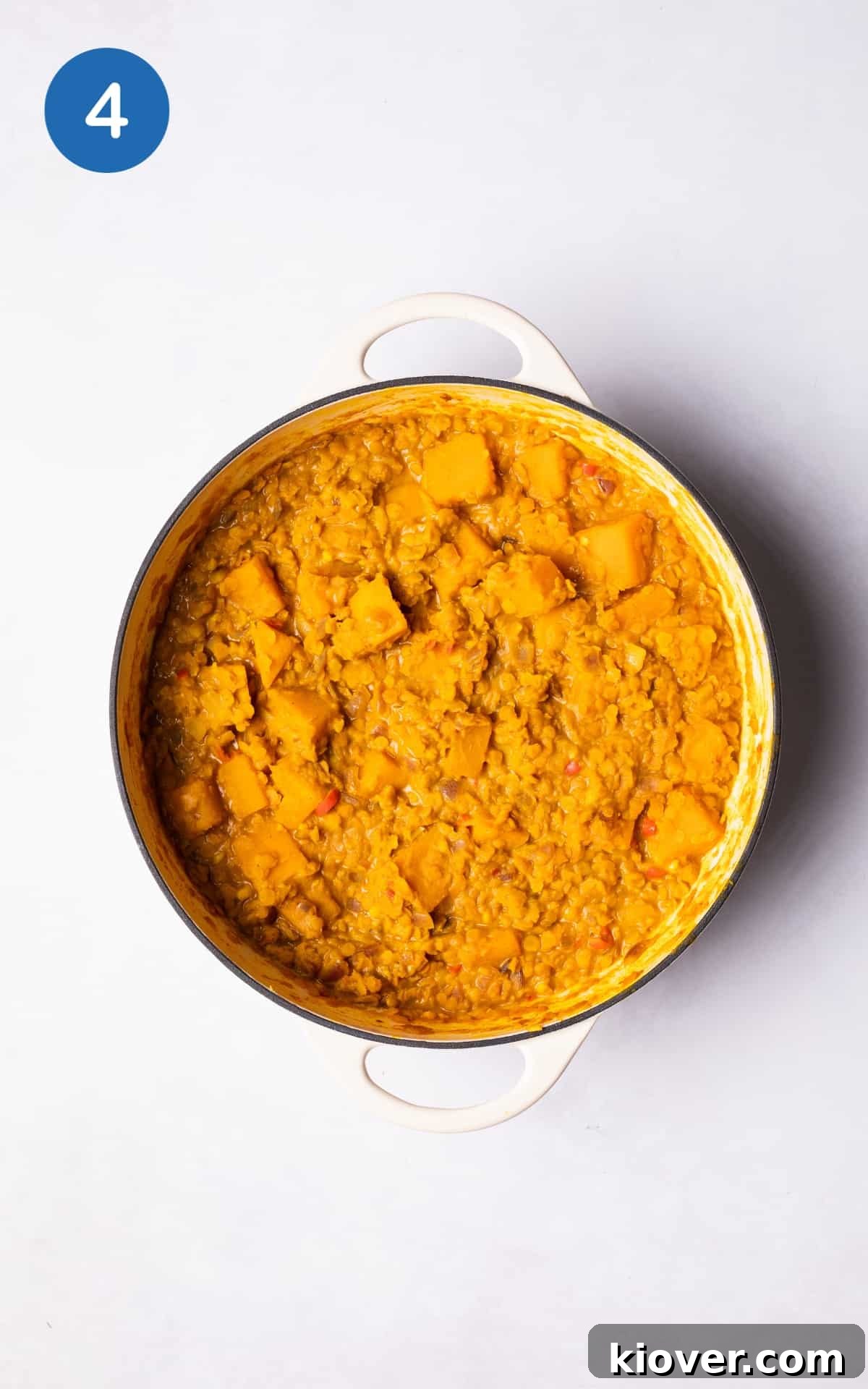Butternut squash and coconut milk in a pot with spices and veg stock.