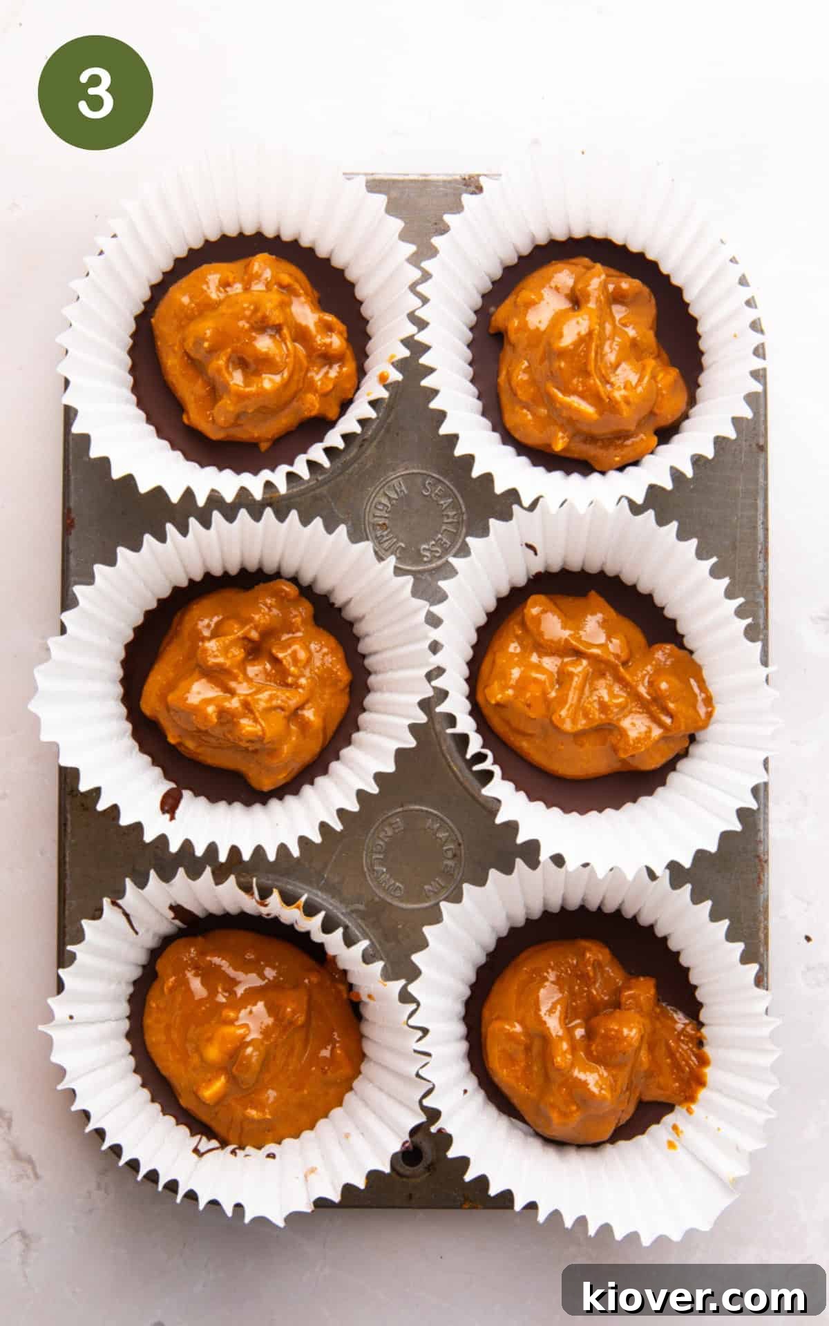 Homemade Peanut Butter Cups Recipe for Rich Chocolate Treats 6 a peanut butter layer over a melted chocolate.