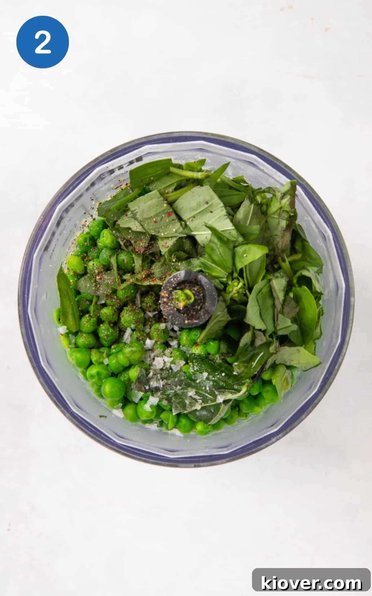 peas with olive oil, fresh basil, salt and pepper in a food processor.