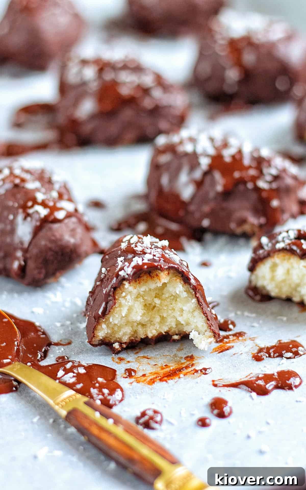 How to Make Homemade Bounty Bars: Chewy Coconut Chocolate Bars 9 homemade bars with coconut and chocolate.