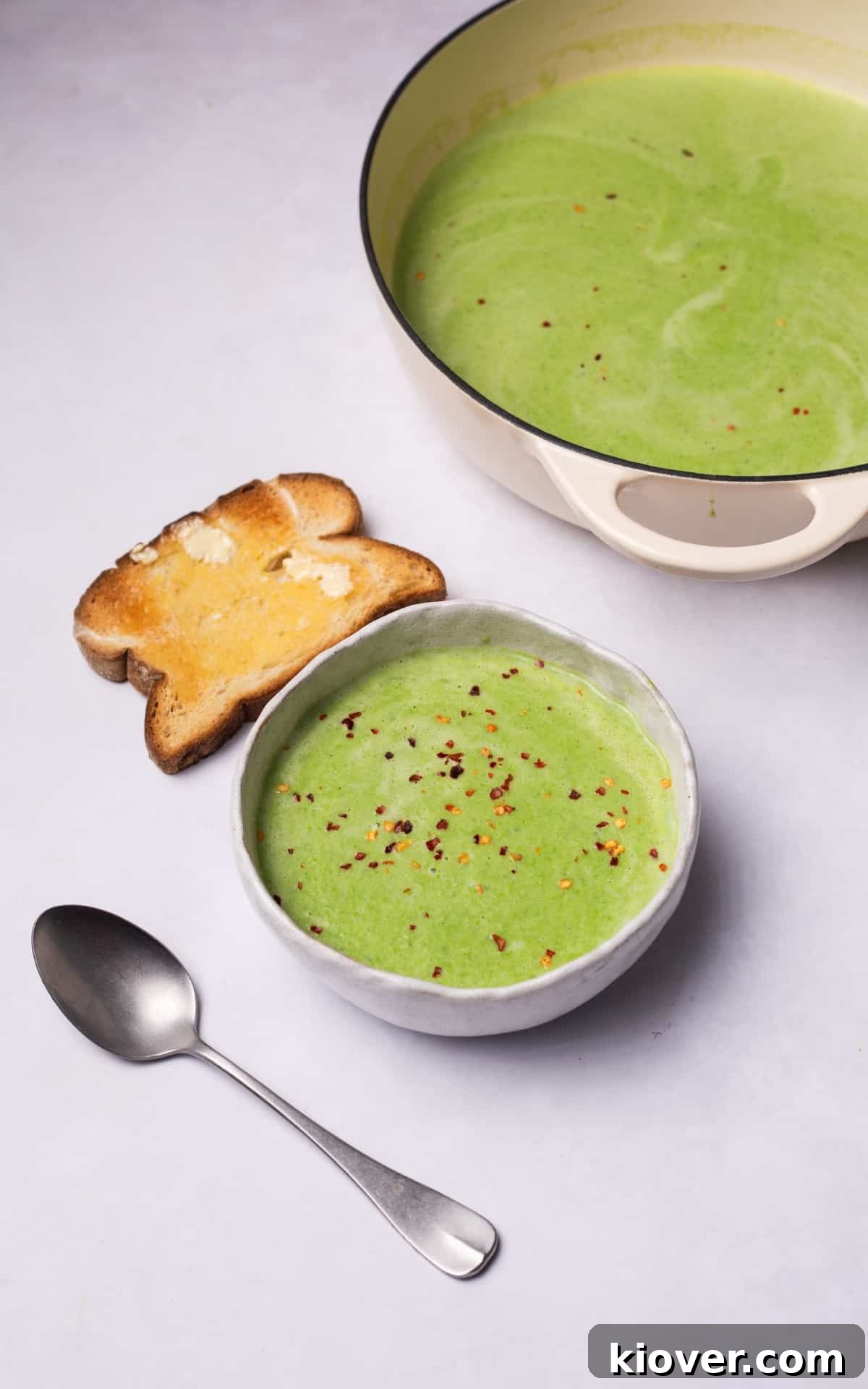 Classic Creamy Split Pea Soup Recipe for Cozy Meals 8 Pea Soup served in a bowl with a slice of toasted bread.