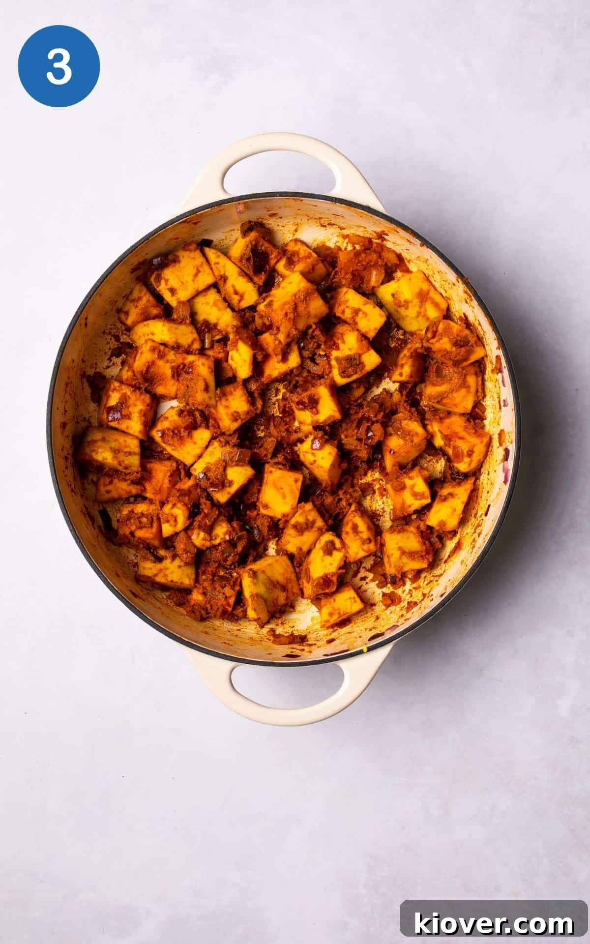 Creamy Pumpkin Curry Recipe with Coconut and Warm Spices 6 Pumpkin with spices in a large pot.