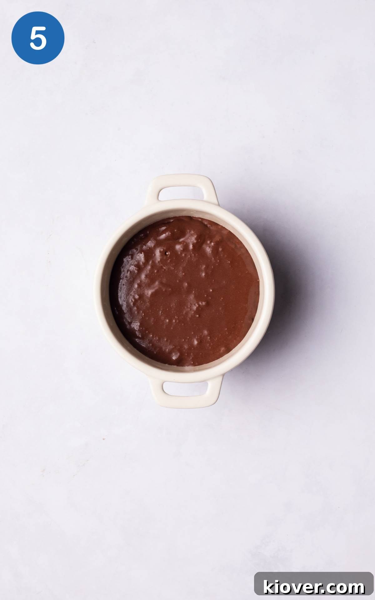 Decadent Chocolate Pots Recipe: Silky Individual Desserts 8 baked lava cake in a ramekin.