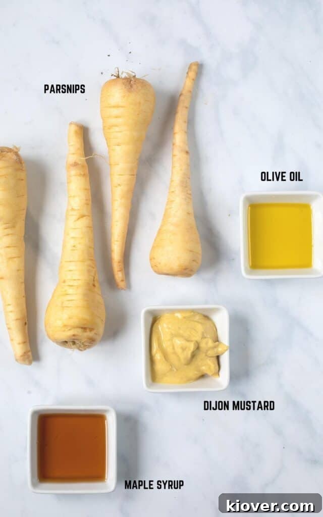 overhead view of labeled ingredients including parsnips, olive oil, Dijon mustard, and maple syrup.