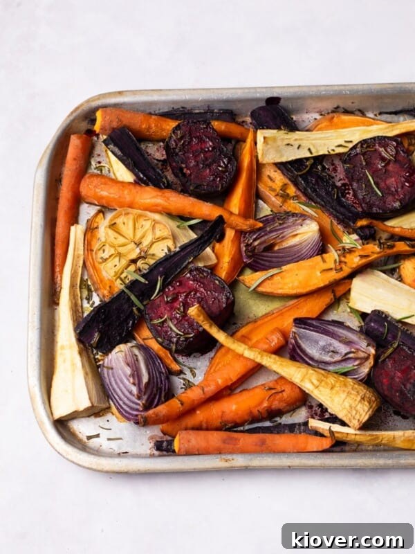 Roasted Root Vegetables on a roasting tray.