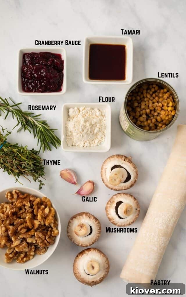 Crispy Vegan Sausage Rolls: Flaky Pastry with Savory Filling 3 Ingredients: Cranberry Sauce, Tamari, Lentils, Flour, Rosemary, Thyme, Garlic, Walnuts, Mushrooms, Pastry.