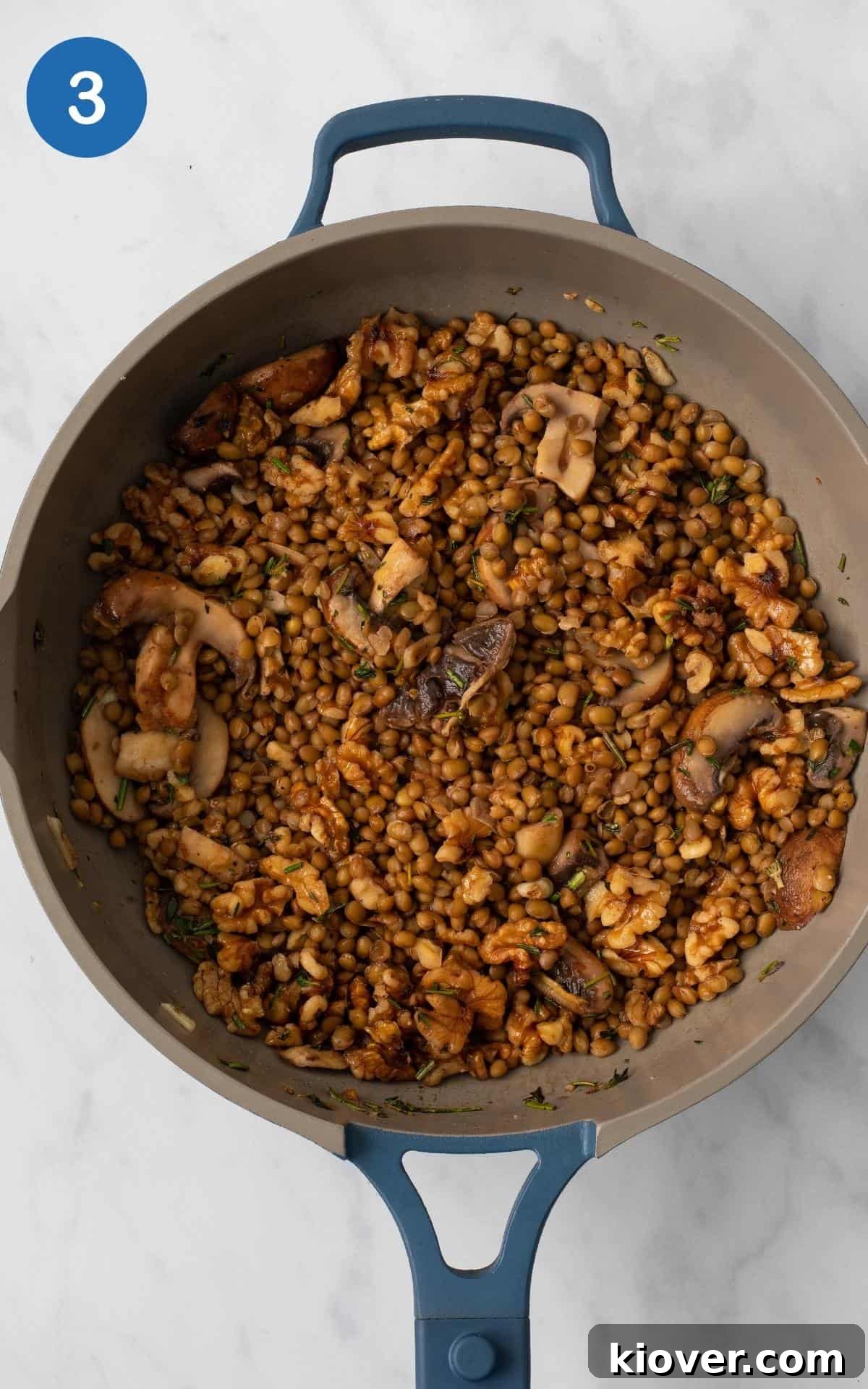 Crispy Vegan Sausage Rolls: Flaky Pastry with Savory Filling 6 Cranberry Sauce, Tamari, Lentils, Rosemary, Thyme, Garlic, Walnuts, Mushrooms, Pastry in a frying pan.