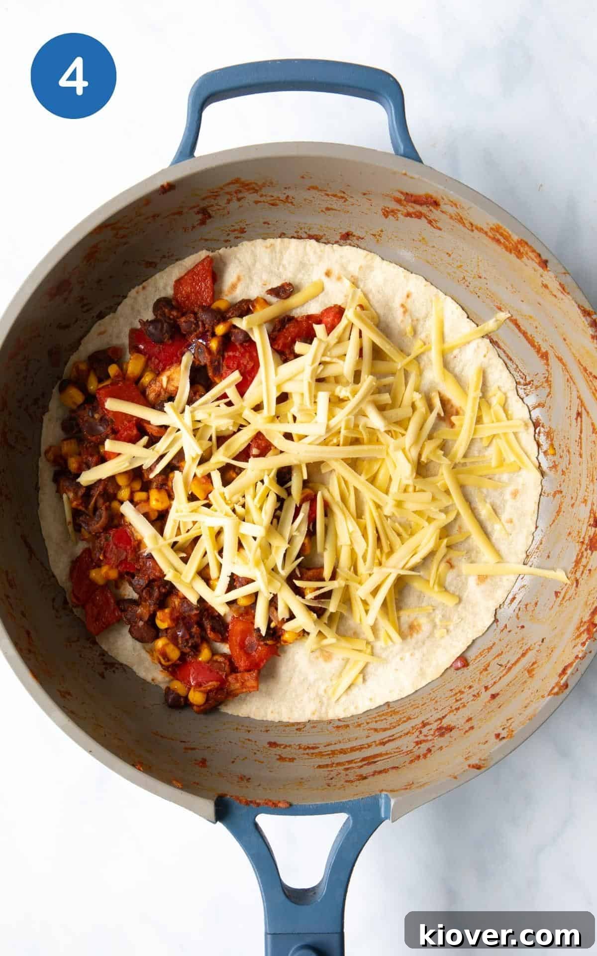 Black Bean Quesadillas with Melty Cheese and Fresh Salsa 7 Sweetcorn, Black Beans, Grated Cheese, Pepper, Mushrooms, spice, garlic, lime, onion, tomato puree in a frying pan.