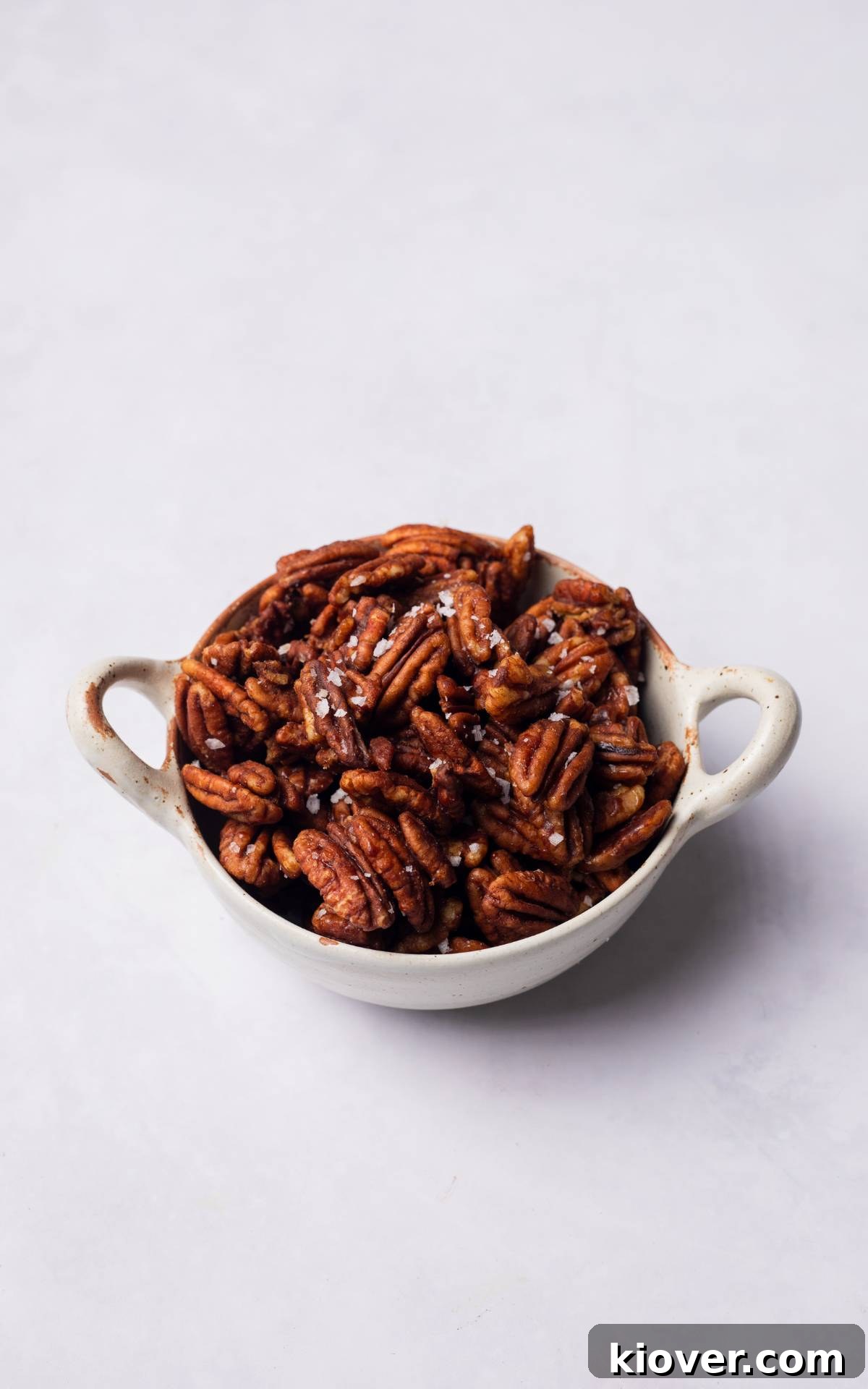 Sweet Cinnamon Candied Pecans Recipe for Gift Giving 7 Candied Pecans served in a bowl.