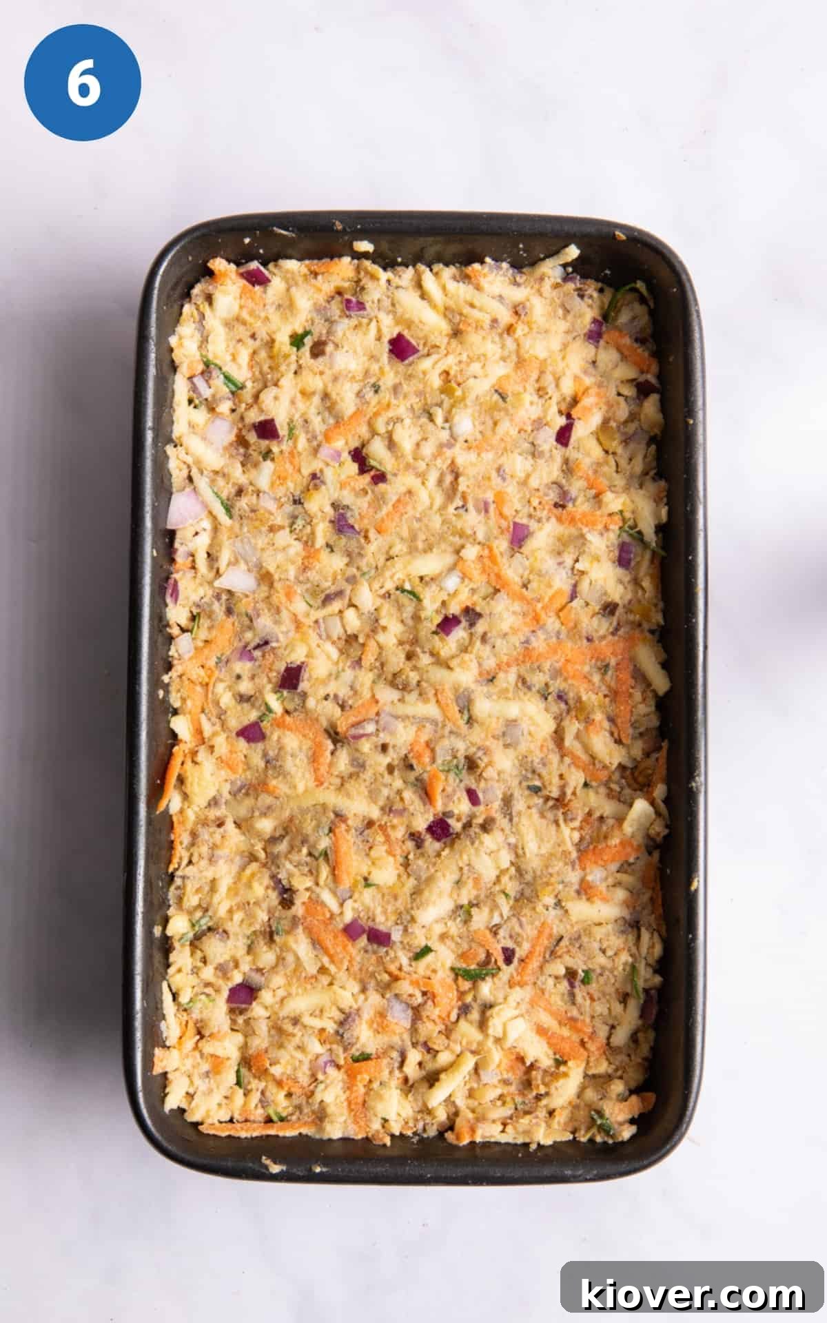 Pre-baked ingredients in loaf tin.