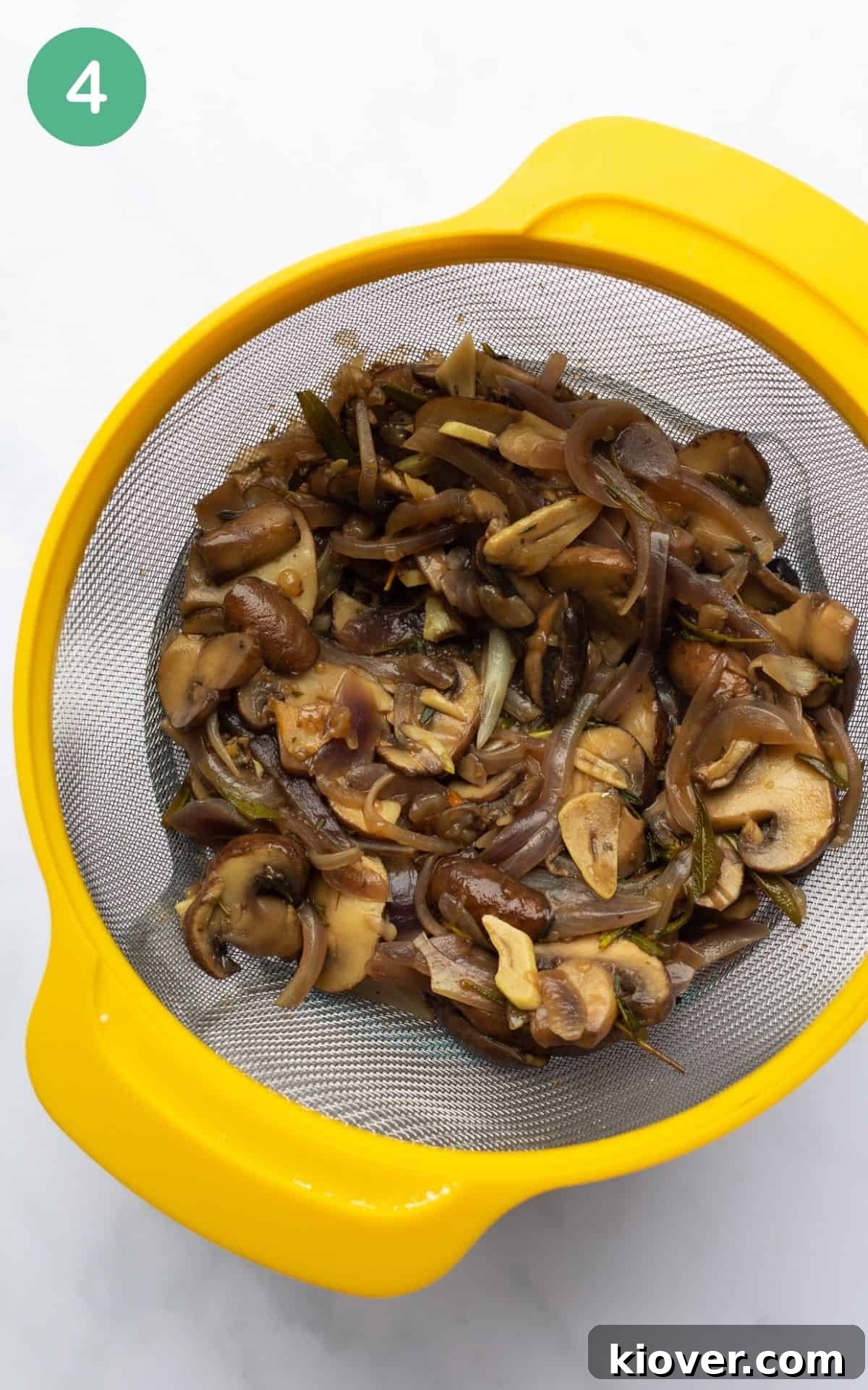 Creamy Mushroom Gravy Recipe for Roast and Mashed Potatoes 7 the mushroom gravy being strained before serving