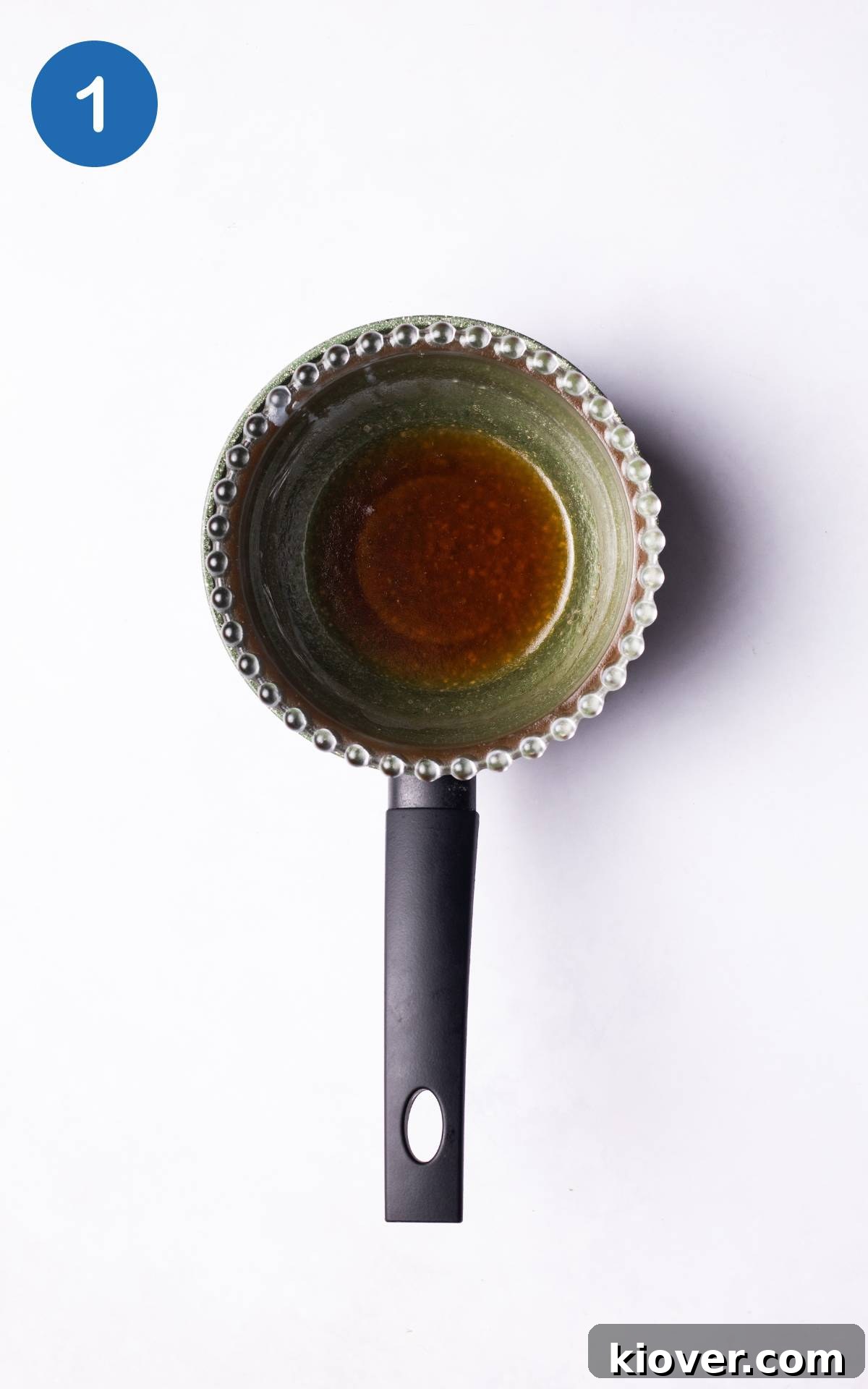 coconut oil, maple syrup, and a pinch of salt combined to a bain-marie.
