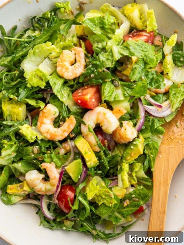 prawn salad with avocado served in a bowl.