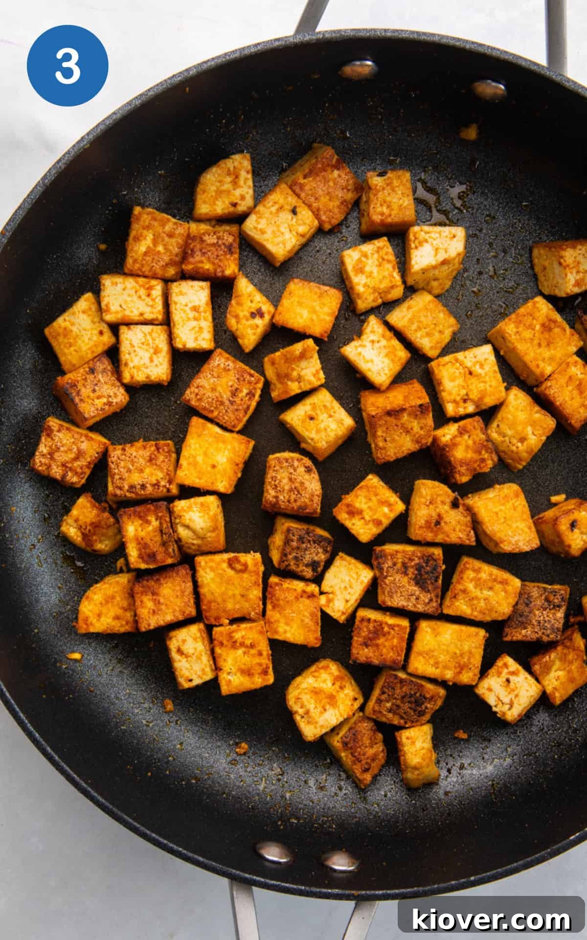 golden tofu in a pan.