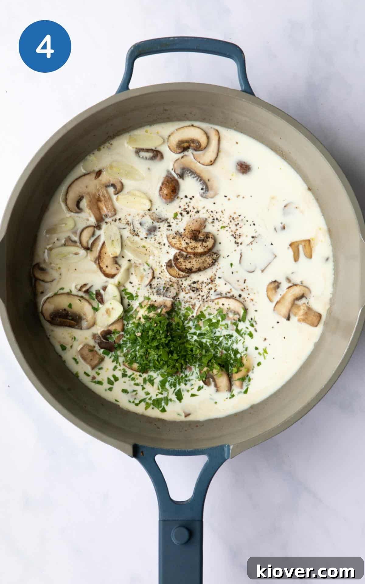 Creamy Vegan Mushroom Pasta Recipe for Dinner Nights 7 Cream, garlic, parsley and mushrooms in a pan.
