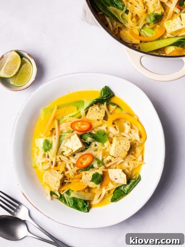 Thai Curry Noodle Soup Recipe — Creamy Thai Coconut Noodle Bowl 9 vegan laksa served on a plate.