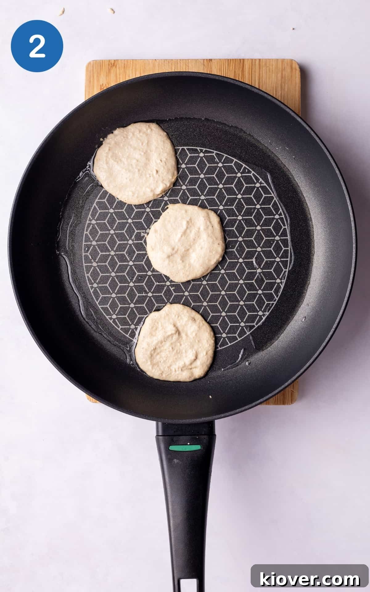 Fluffy Banana Oat Pancakes Recipe for Quick Morning Meals 5 3 Banana Oat Pancakes in a heated pan.