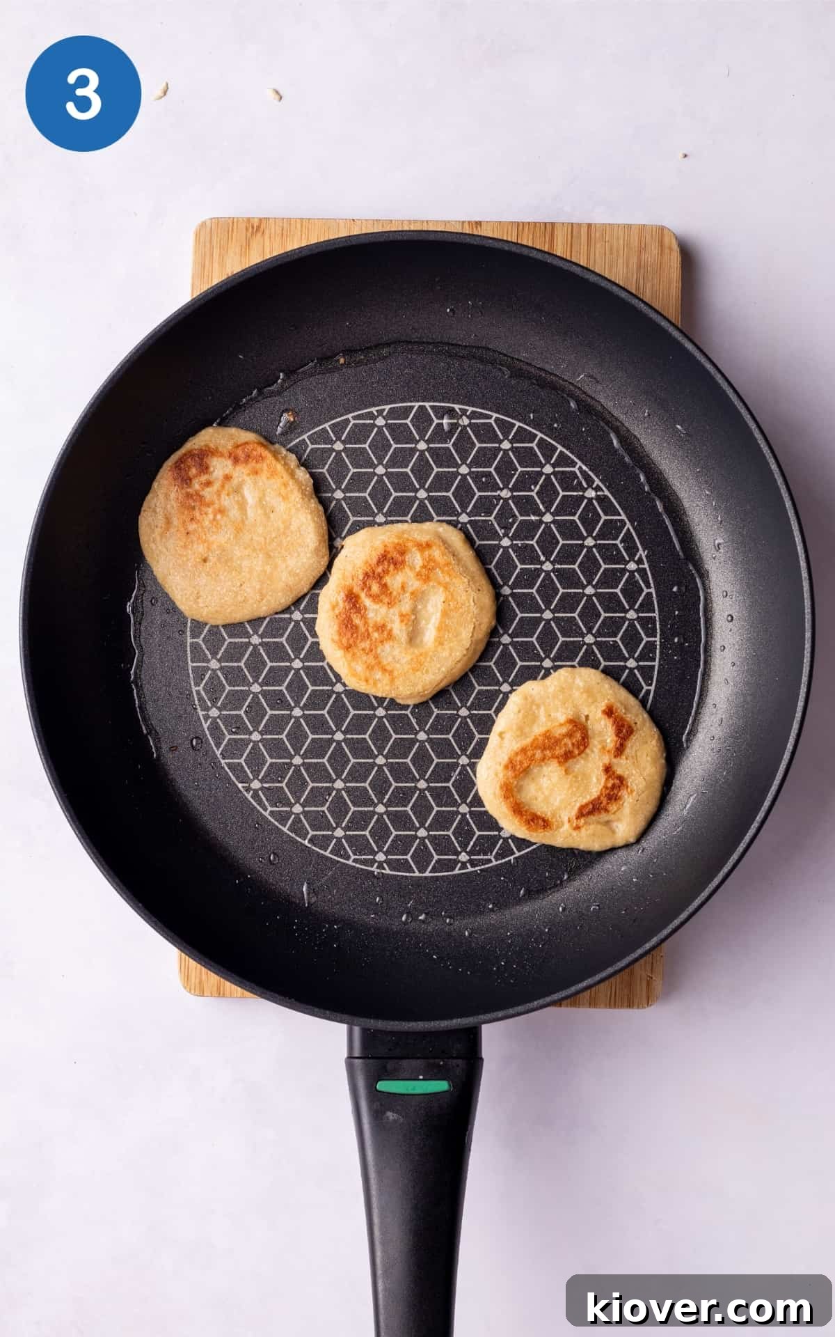 Fluffy Banana Oat Pancakes Recipe for Quick Morning Meals 6 3 fried Banana Oat Pancakes in a pan.