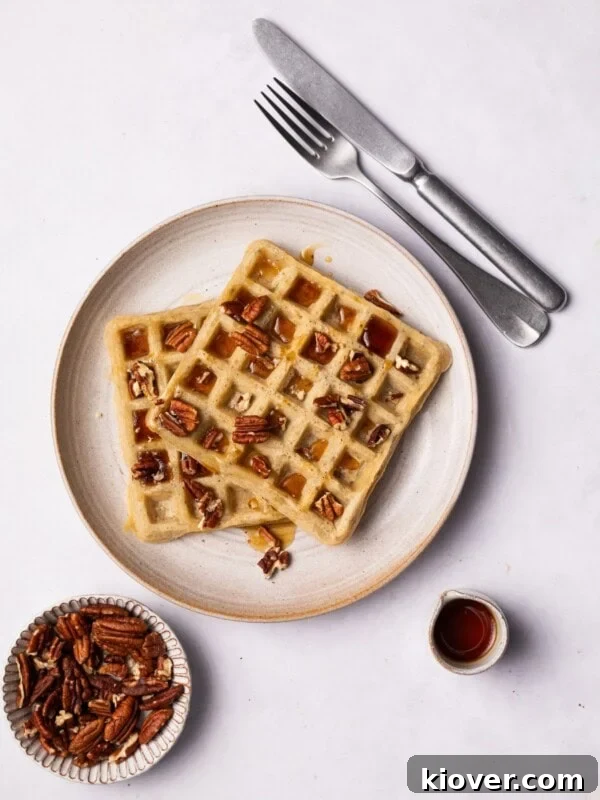 Fluffy Banana Oat Pancakes Recipe for Quick Morning Meals 9 Gluten Free and dairy free waffles on the plate.