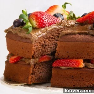 chocolate cake on to white cake stand