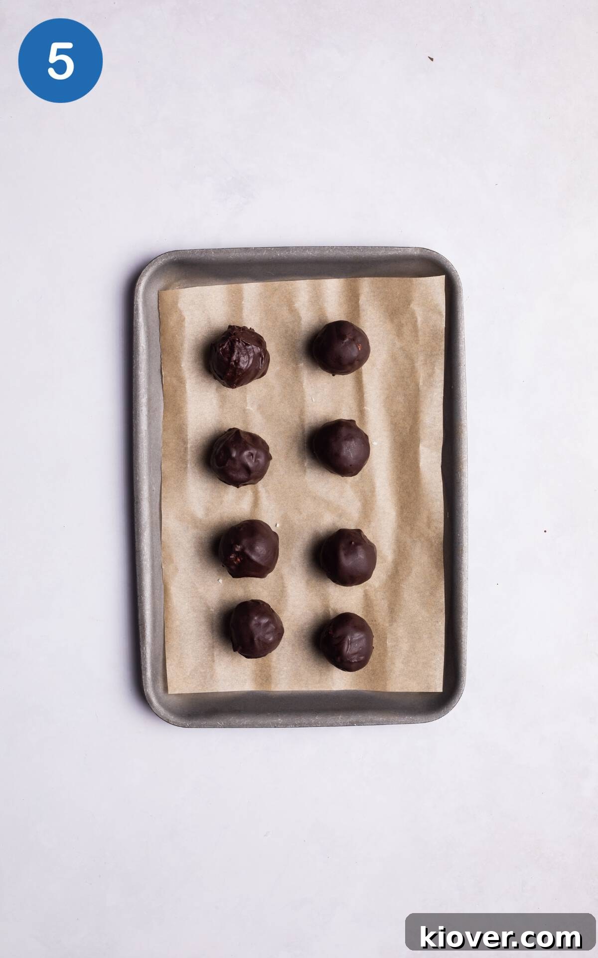 Coconut balls coated with chocolate.