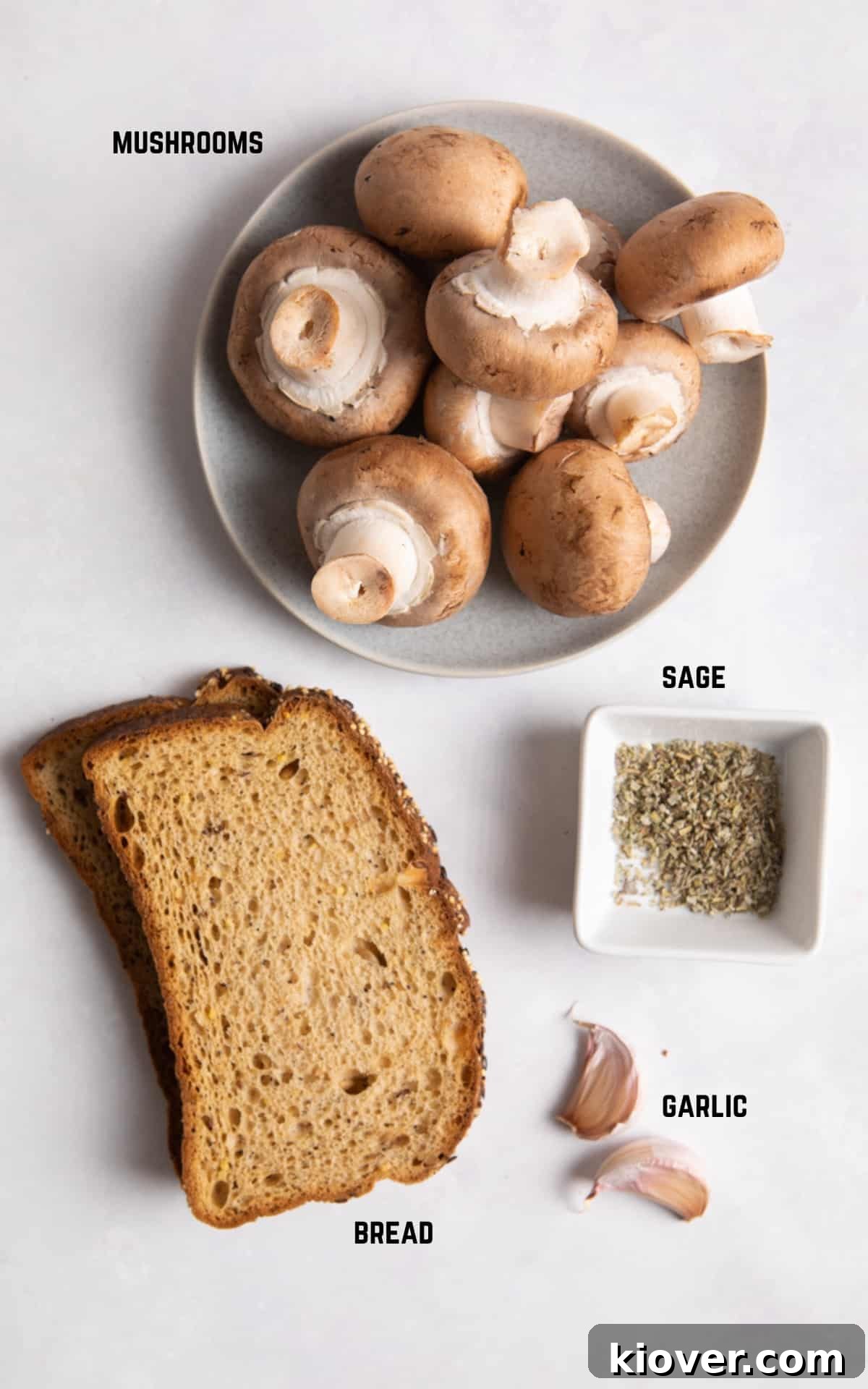 Garlic Butter Mushrooms on Toast with Herbs 3 ingredients led on white surface.