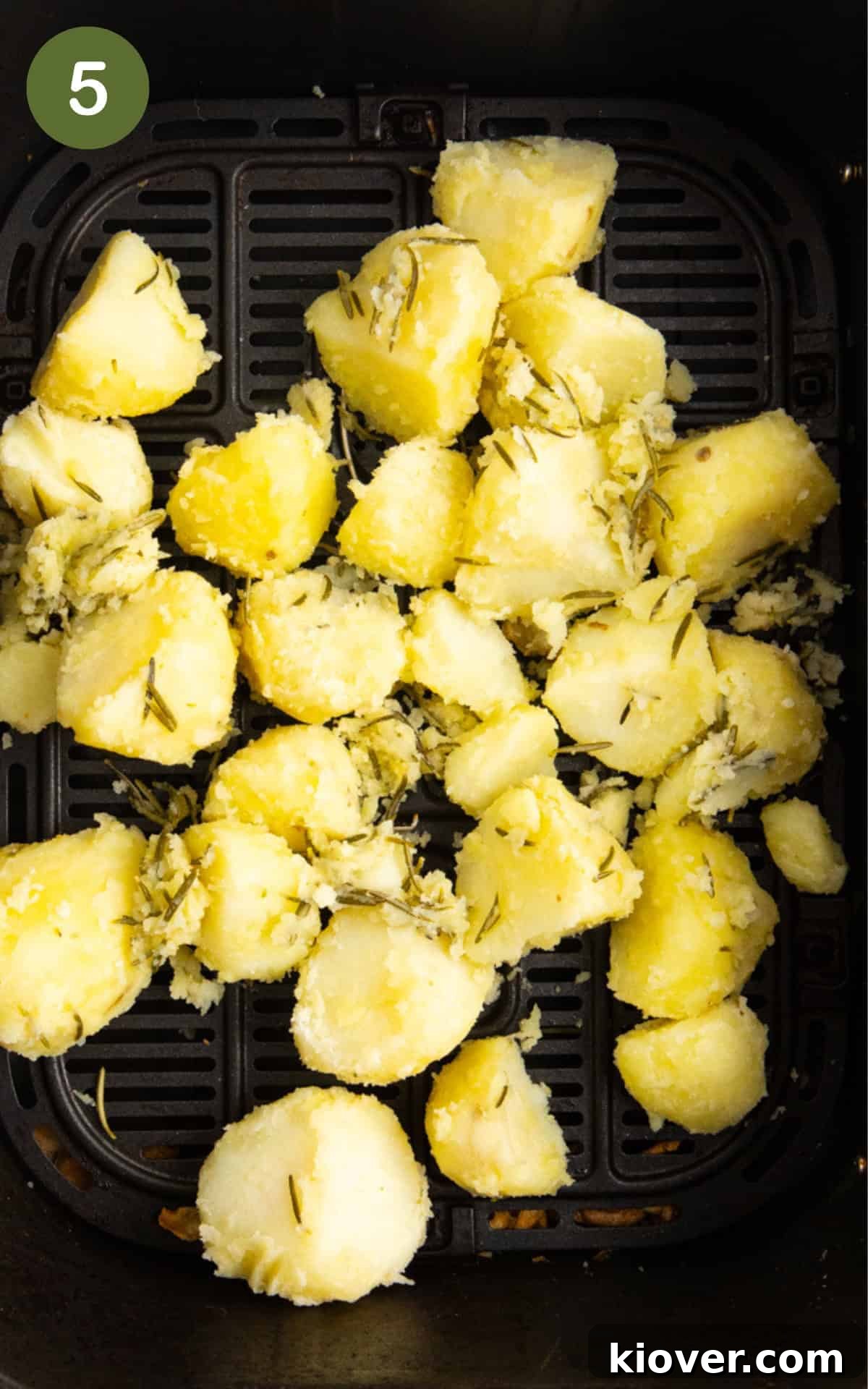 Crispy Air Fryer Roast Potatoes Recipe for Perfect Sides 8 chopped potatoes in the air fryer basket.