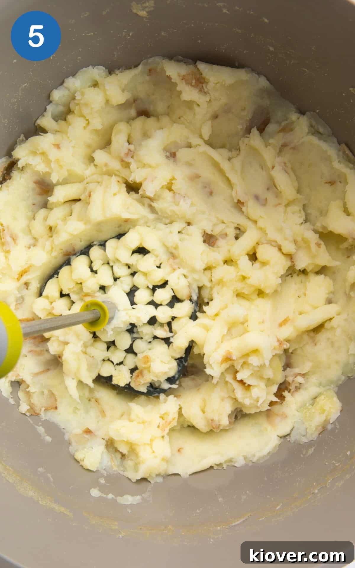 Crispy Potato Cakes Recipe: Fluffy Inside, Golden Outside 8 mashed potatoes in a pot.