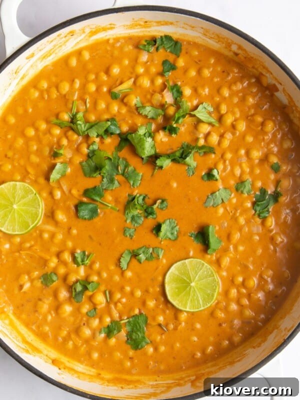 overhead shot of peanut butter curry in large white casserole dish.