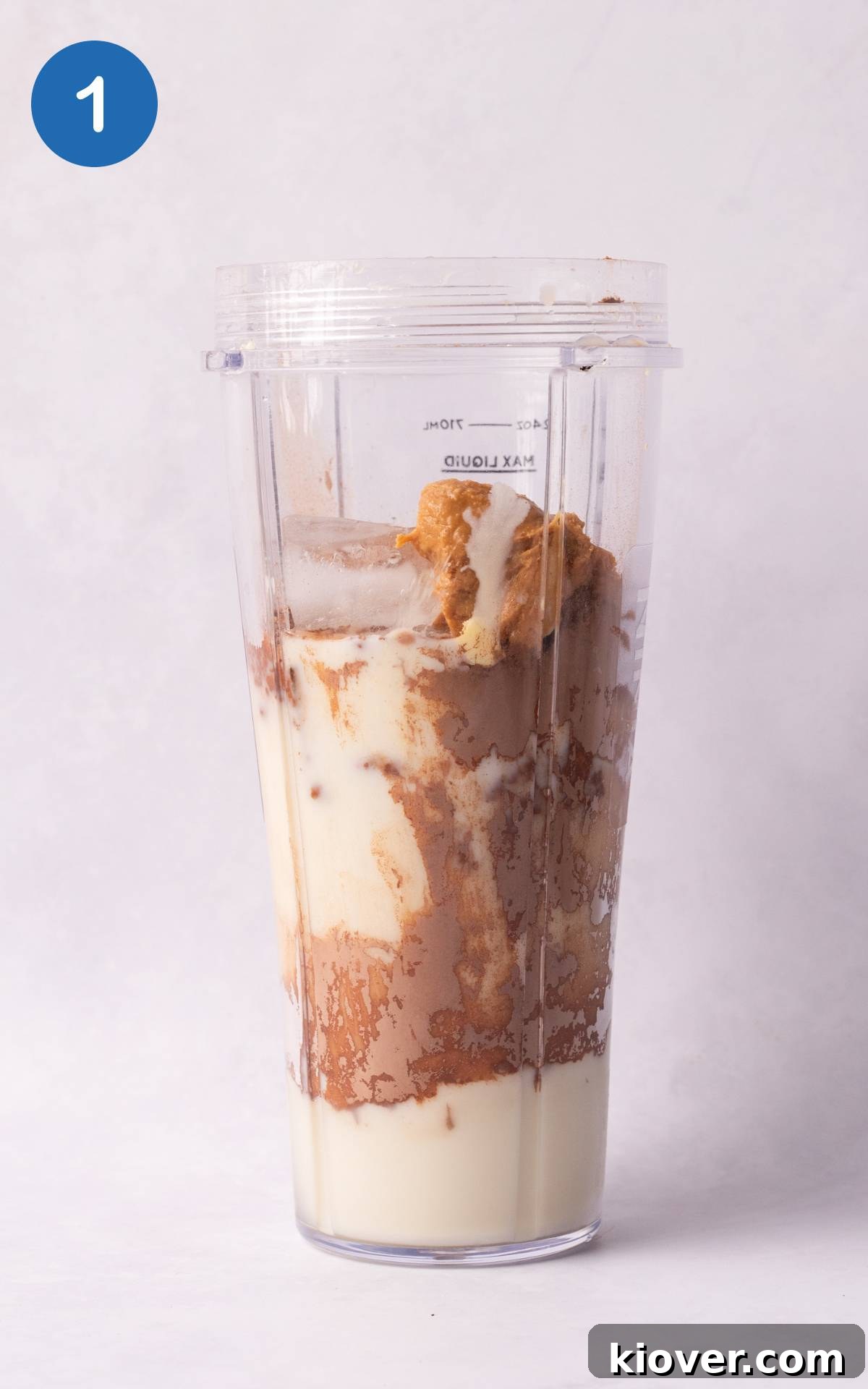 Ingredients for the milkshake in a blender.