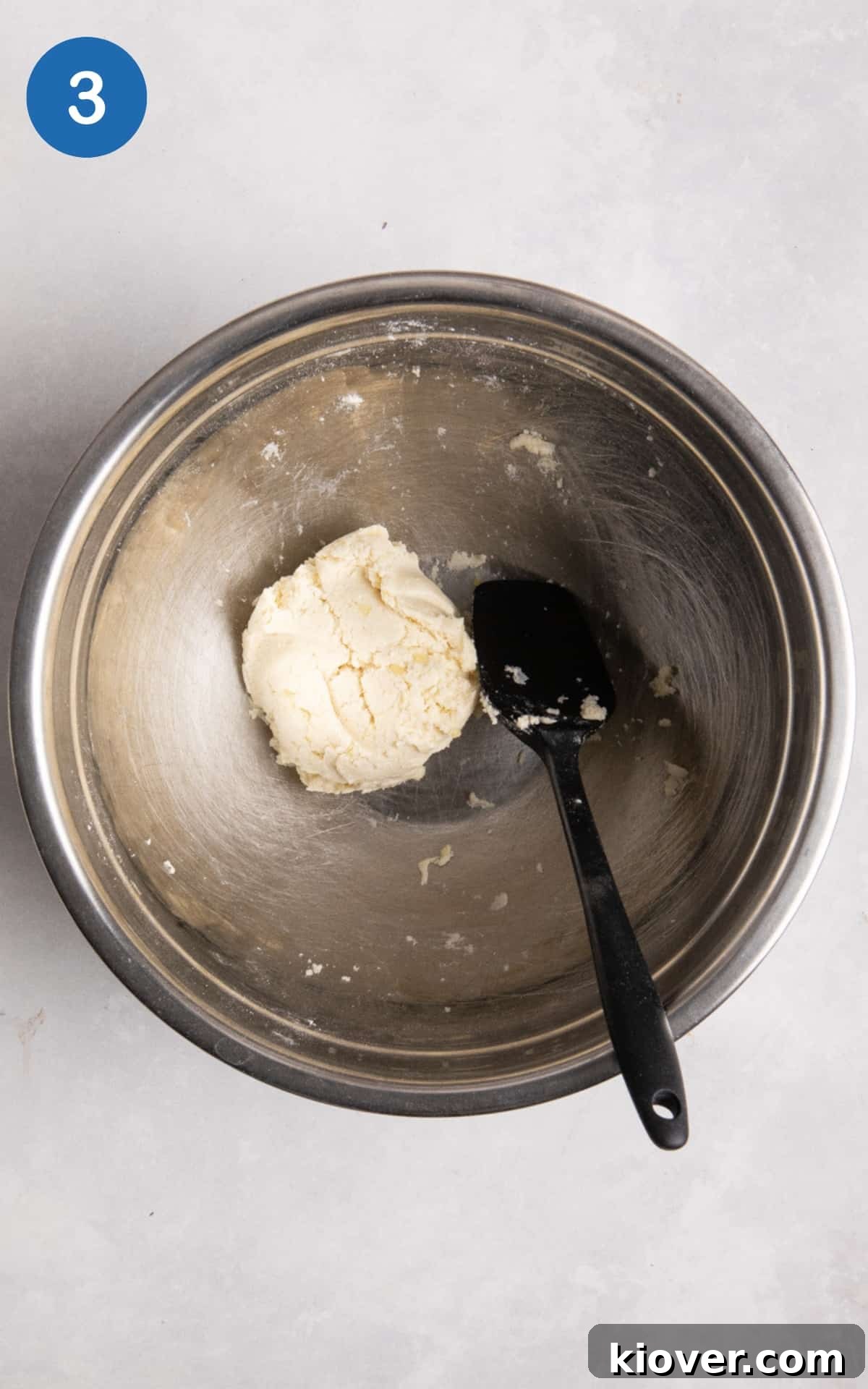 Gluten free flatbread dough in a mixing bowl.