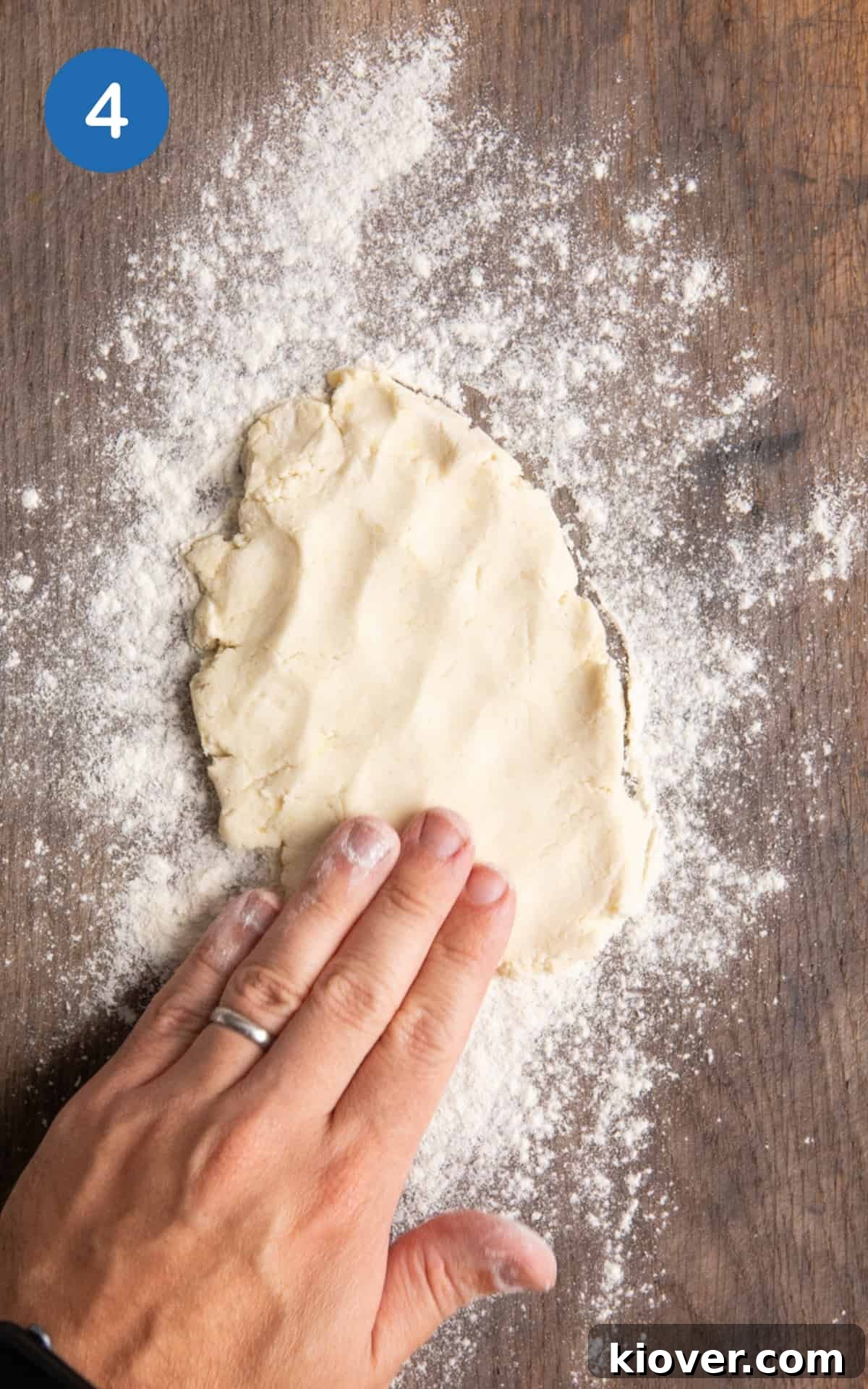 Gluten Free flatbread dough on a work surface with flour.
