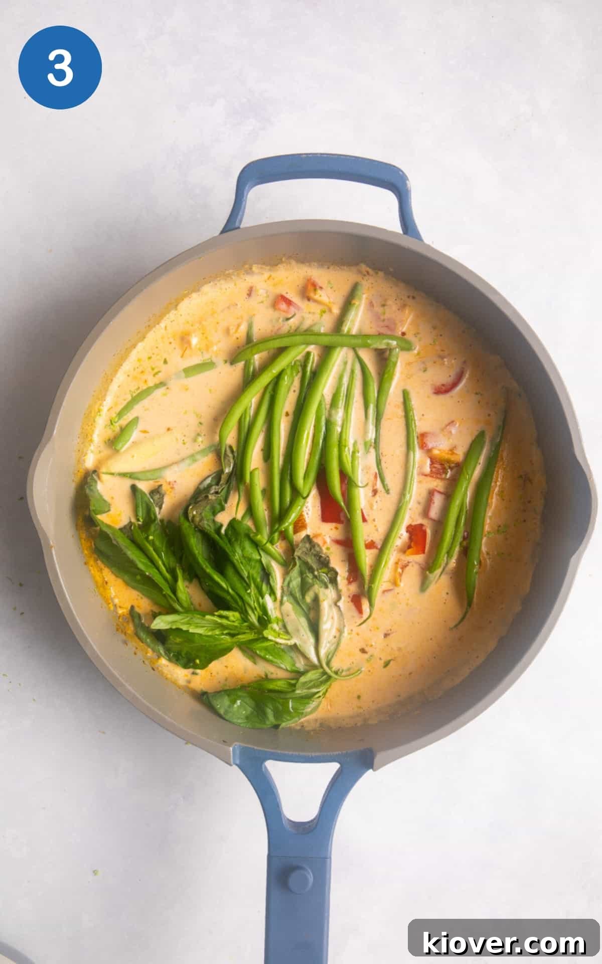 further ingredients added to large shallow frying pan to make the curry.