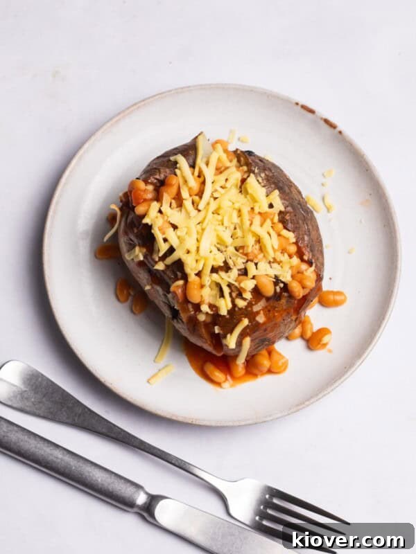 Air Fryer Jacket Potato topped with beans and cheese.
