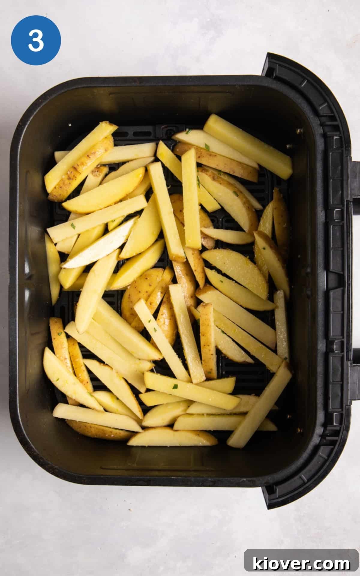 Crispy Air Fryer French Fries: Quick Homemade Recipe 6 chips in air fryer before cooking.