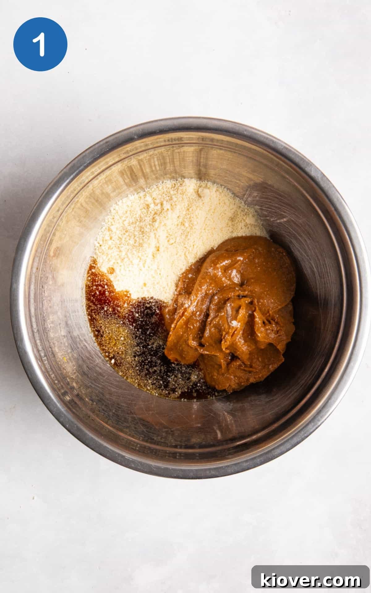 No-Bake Peanut Butter Protein Balls for Snacks & Desserts 4 Ingredients to make peanut butter balls in a mixing bowl.