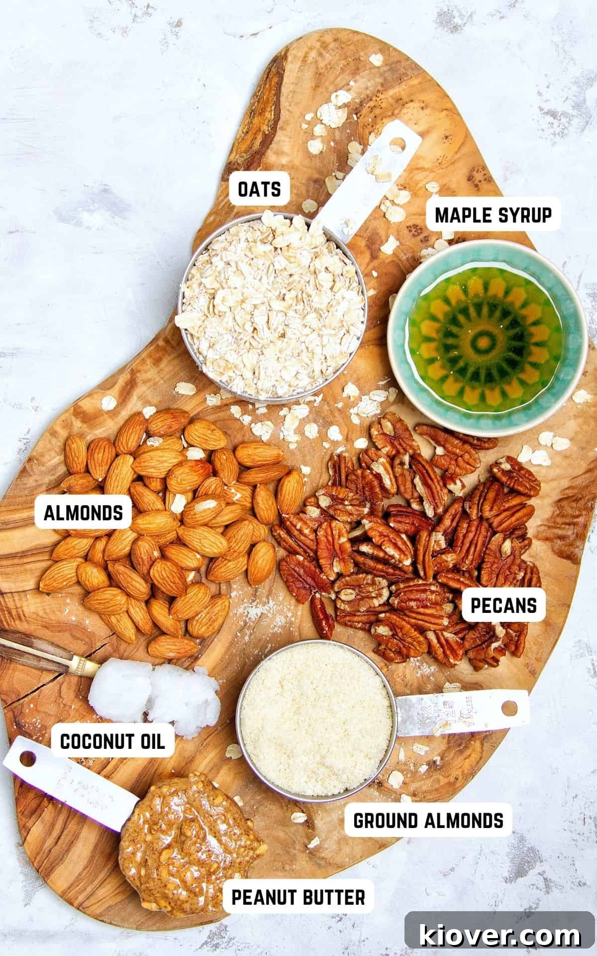 ingredients to make peanut butter granola on a wooden board