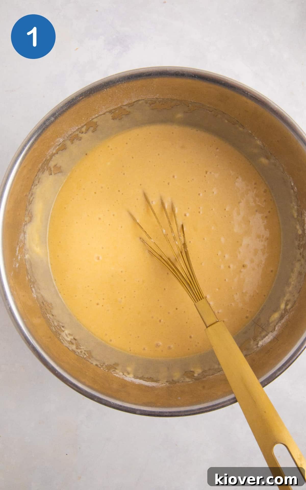 Gluten-Free Victoria Sponge Cake Recipe for Light, Fluffy Layers 4 Gluten Free Victoria Sponge batter mixed in a silver mixing bowl