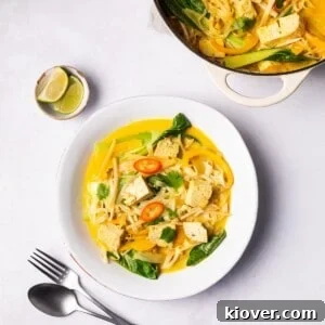 Creamy Vegan Laksa Recipe: Flavorful Plant-Based Coconut Curry Soup 14 vegan laksa served on a plate.