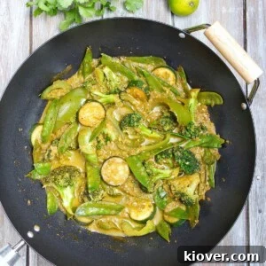 Vegetable Thai Green Curry in a wok.
