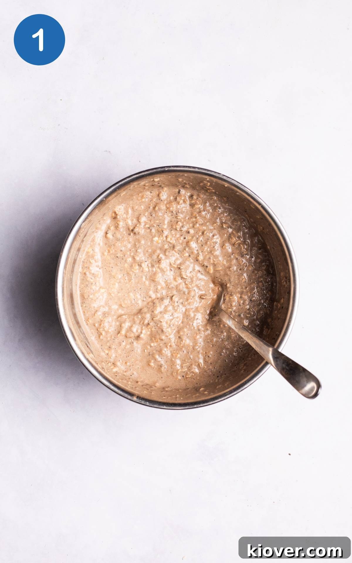 protein overnight oats ingredients combined in a bowl.