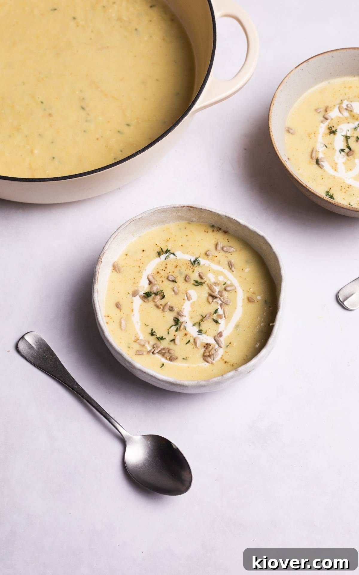 Creamy Roasted Parsnip Soup Recipe with Garlic and Thyme 7 Parsnip soup garnished with sunflower seeds and black pepper.