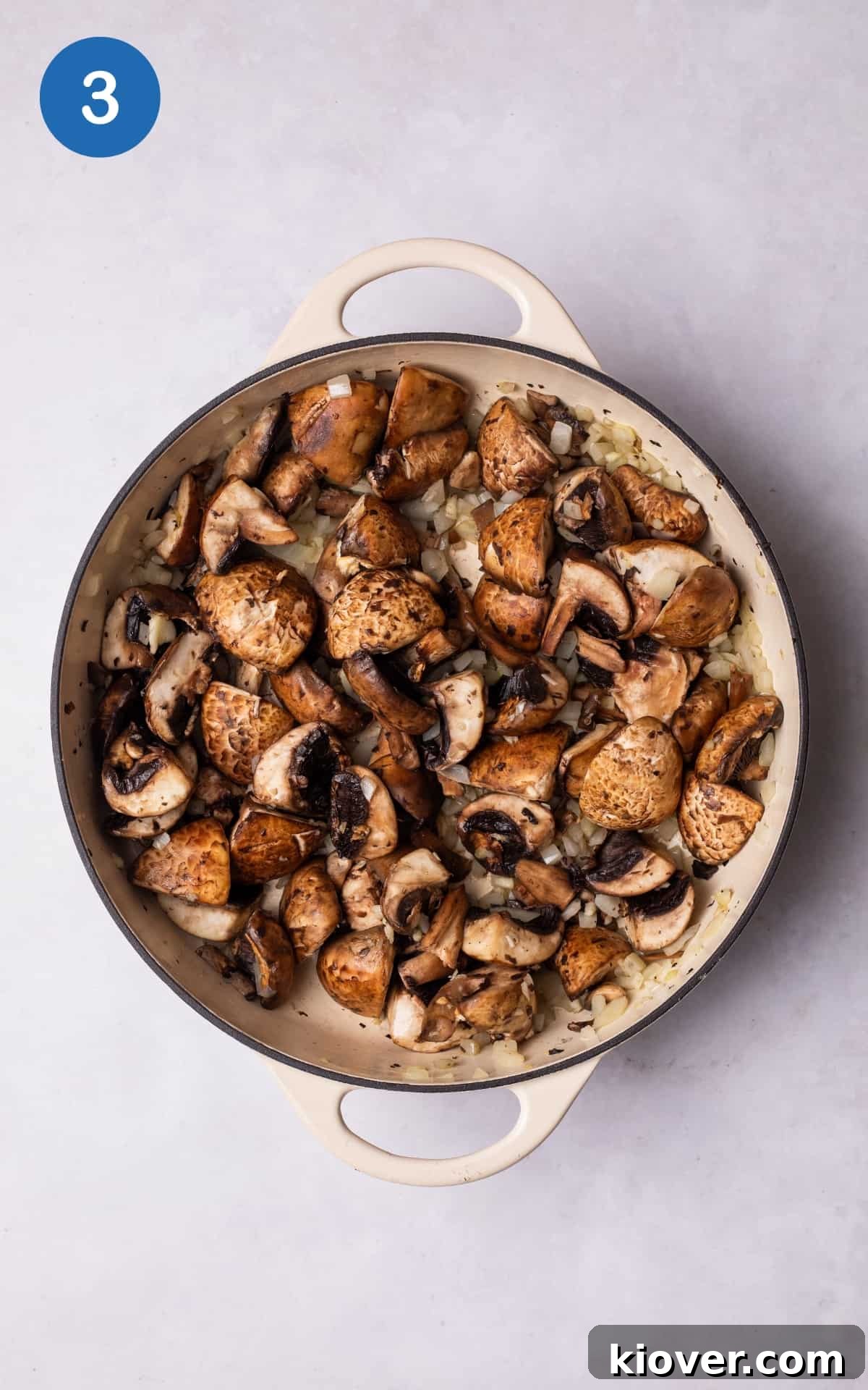 Creamy Wild Mushroom Soup Recipe for Cozy Weeknights 6 adding the mushroom chunks to the pan.