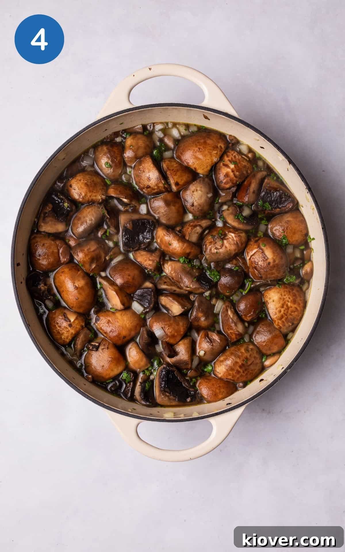 Creamy Wild Mushroom Soup Recipe for Cozy Weeknights 7 Adding the stock, salt, pepper, and parsley.