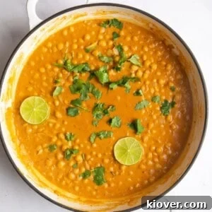 overhead shot of peanut butter curry in large white casserole dish.